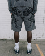 'EARN YOUR STRIPES' REVERSIBLE TAPESTRY SHORTS